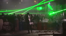Police and protesters clash during another night of fierce rioting in Colombian capital