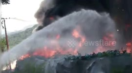 Abandoned bikes burnt as huge fire rages in eastern China