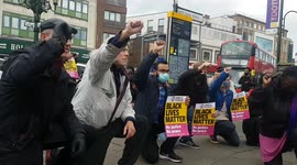 Anti-racism campaigners in south London take the knee remembering George Floyd's death one year on