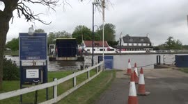 Reedham chain ferry across the River Yare on the Norfolk Broads, UK, 25 May 2021