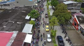Huge queues line streets of Colombian town due to gasoline shortage