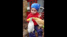 This 2-year-old boy has formed an adorable bond with his pet chickens