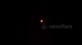 Supermoon Total Eclipse Dazzles Across Pacific
