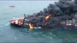 Thick black smoke was emitted from a cargo ship that carried chemicals caught fire in the seas of Srilanka