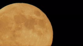 Close up of the stunning Full Flower Supermoon rising in Kent, UK