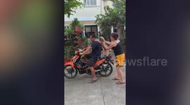 Clingy pet dog refuses to leave scooter after riding with owner
