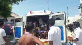 Twenty-six patients with COVID-19 forced to cram into TWO ambulances in southern India