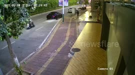 Scooter rider runs away after crashing into parked Bentley car in China