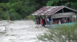 Crowds gather in Indonesia to watch surfers take on renowned tidal bore