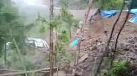 Dramatic footage shows landslide bringing down road in cyclone-damaged eastern India
