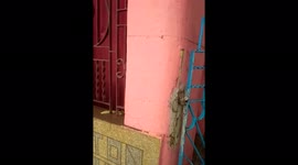 Houses flooded with water and the marking left by the flood on the wall show the height of the flood.