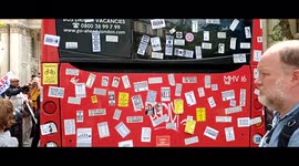 Protesters cover London red bus with anti-lockdown stickers during 'Unite for Freedom' rally