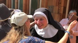 Cheerful London nuns hug anti-lockdown protesters during 'Unite For Freedom' rally