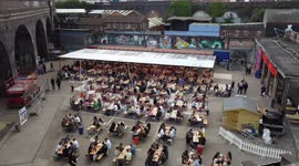 Revellers hit the beer gardens in Birmingham, England as temperatures soar