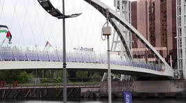 Free Palestine activists march over bridges in Media City, Manchester
