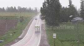 Snow at the end of May in southern Ontario Canada including these farm fields with freshly planted crops north of Guelph Ontario