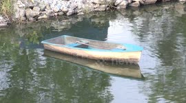 A ghost takes a small boat and wanders aimlessly around a small lake.