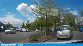 Abusive Road Rager gets told twice he's in the wrong , by the dash cammer and the guy in front of him