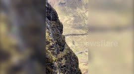 'Heart in mouth' moment two daredevils jump off the narrowest ridge in the UK
