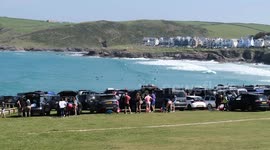 Polzeath beach car park filling up early on a hot bank holiday Monday