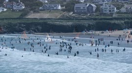 Hundreds pour onto Polzeath beach in Cornwall to enjoy sunny Bank Holiday Monday