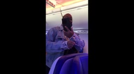 Passengers sing as passenger is kicked off Southwest Airlines flight in LaGuardia