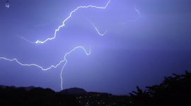 Thousands of lightning bolts crackle across the skies above San Sebastian in Spain