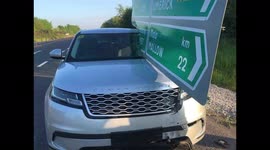 Car almost cut in two by large traffic sign in co cork ireland