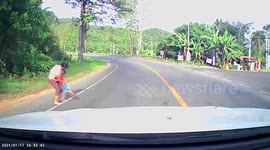 Heart-stopping scene shows truck nearly missing toddler
