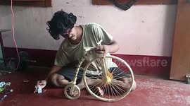 Youth constructs penny-farthing model using matchsticks in eastern India
