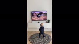 Two-year-old child dances crazily as he hears techno version of Danish children song