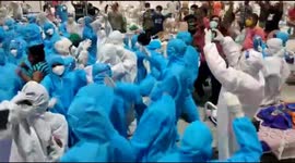 Medical staff dance with patients as they mark year anniversary of COVID-19 in western India