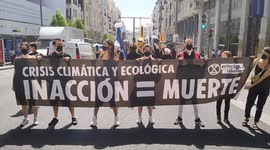 Extinction Rebellion gather in Madrid calling for ecocide to be recognised as an international crime