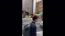 Evacuees from Hilton hotel wrapped in foil blankets outside London Bridge Station