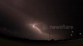 Lightning streaks across sky above Texas as storm passes over state
