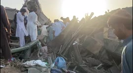 Rescue efforts continue at scene of Pakistan train crash