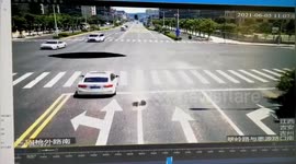 Car falls into sinkhole that opened up on road in southern China