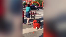 Chinese parents pray for students outside school before university entrance exam