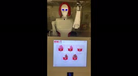 Interactive robotic bar with two employees serves ice cream in Prague