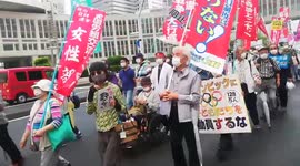 Hundreds march through Japanese capital protesting against Tokyo Olympics