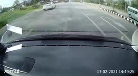 Car crashes into loose wheel that falls from truck in Thailand