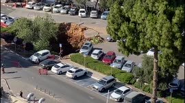 Sinkhole that swallowed cars at Jerusalem hospital continues to implode