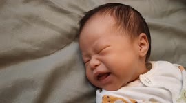 Adorable newborn baby's facial expressions