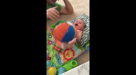This hysterical baby's contagious laugh will brighten up your day