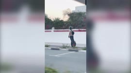 A driver captured this pedestrian whizzing down the road on a motorised Unicycle in Dubai