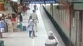 Railway security personnel saves man from getting crushed beneath moving train in eastern India