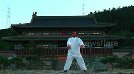 Taoist Yuan Xiugang, a 15th generation disciple of the Wudang Sanfeng sect, performs a set of Taichi combined with some Bagua movements