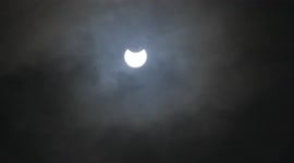 Partial solar eclipse visible in skies above Derbyshire, UK despite clouds