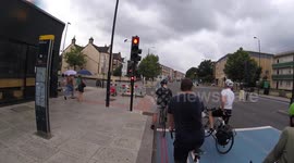 Instant karma for red light jumping cyclist