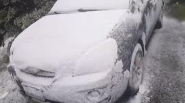 Unseasonable snow slams Canada
